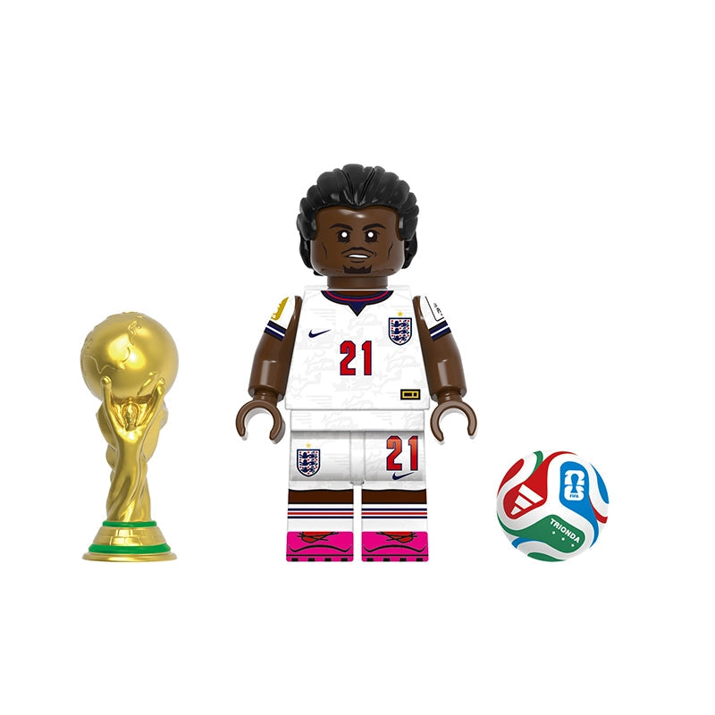 A toy soccer minifigure labeled 'Eze' with a gold FIFA trophy on the left and a soccer ball on the right, shown on a plain white background with the code GH0827 at the top.