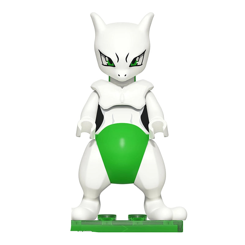 A toy minifigure of Shiny Mewtwo from Pokémon, standing on a green base. The figure is primarily white with a bright green belly and green eyes, and small black details.