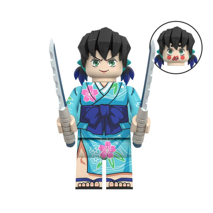 Toy figure of Hashibira Inosuke in a kimono with two swords, WM2550, on a white background.