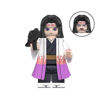 Toy figure of Ubuyashiki Kiriya with black hair and purple outfit on a white background