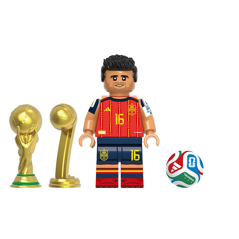 A soccer-themed toy minifigure labeled 'Rodri' stands between two gold trophy statues and a multicolor soccer ball on a plain white background. A gray label at the top reads 'GH0814'.