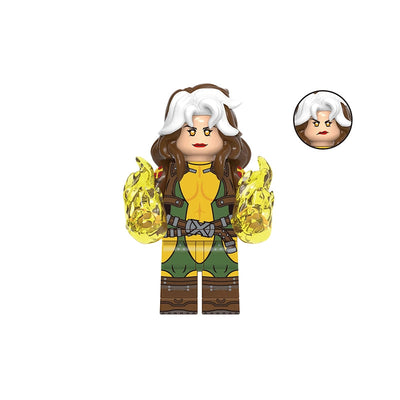 A custom minifigure of Rogue from X-Men, featuring yellow and green suit, brown hair, and white hair accents, with yellow flame hands and an alternate head accessory shown on a white background.