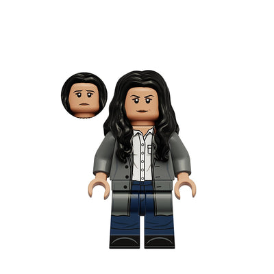 A custom LEGO-style minifigure of Michelle Jones, featuring long black hair, a gray jacket over a white shirt, blue pants, and black shoes. An inset shows the interchangeable head with a concerned expression.